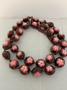 Hand painted wooden necklace.